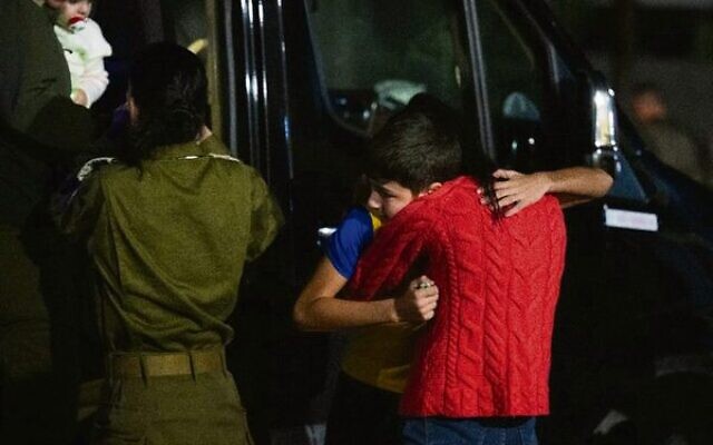 Eitan Yahalomi hugs his mother after getting off an IDF helicopter after being released from Hamas captivity. Photo: IDF Eitan Yahalomi hugs his mother after getting off an IDF helicopter after being released from Hamas captivity. Photo: IDF