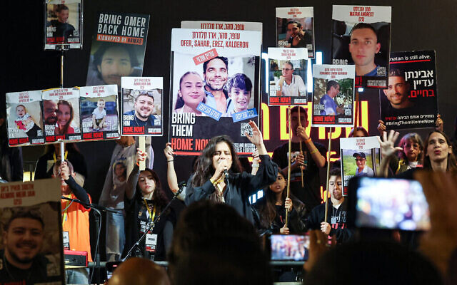 Protesters attend a demonstration for the release of hostages held by terrorists in Gaza since the October 7 attack, in Tel Aviv on December 2, 2023. (The Times of Israel: AHMAD GHARABLI / AFP) Protesters attend a demonstration for the release of hostages held by terrorists in Gaza since the October 7 attack, in Tel Aviv on December 2, 2023. (The Times of Israel: AHMAD GHARABLI / AFP)