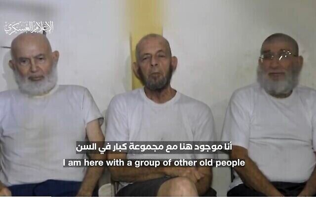 Screen capture from undated propaganda video released by the Hamas terror group on December 18, 2023 shows (L-R) Amiram Cooper, Chaim Peri, and Yoram Metzger, three Israelis held hostage since October 7 in the Gaza Strip. (The Times of Israel: X. Used in accordance with Clause 27a of the Copyright Law) Screen capture from undated propaganda video released by the Hamas terror group on December 18, 2023 shows (L-R) Amiram Cooper, Chaim Peri, and Yoram Metzger, three Israelis held hostage since October 7 in the Gaza Strip. (The Times of Israel: X. Used in accordance with Clause 27a of the Copyright Law)