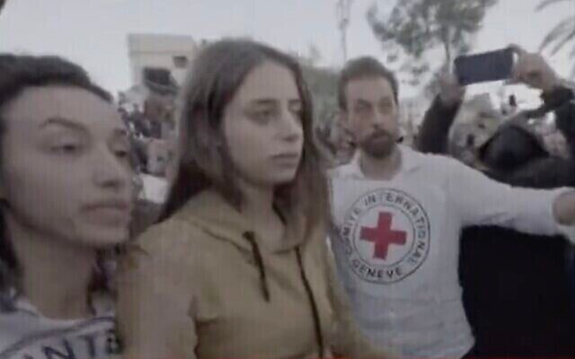 Israeli hostage Mia Schem is transferred to Red Cross custody by Hamas terrorists, in Gaza City, ahead of her return to Israel, November 30, 2023. (The Times of Israel: Telegram screen capture: Used in accordance with Clause 27a of the Copyright Law) Israeli hostage Mia Schem is transferred to Red Cross custody by Hamas terrorists, in Gaza City, ahead of her return to Israel, November 30, 2023. (The Times of Israel: Telegram screen capture: Used in accordance with Clause 27a of the Copyright Law)