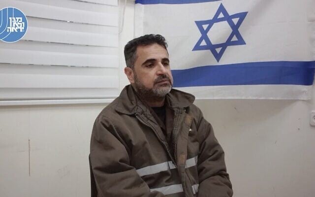 Director of Gaza's Kamal Adwan hospital Ahmed Kahlot is seen being interrogated by the Shin Bet in a video published on Tuesday, December 19, 2023. (The Times of Israel: Shin Bet) Director of Gaza's Kamal Adwan hospital Ahmed Kahlot is seen being interrogated by the Shin Bet in a video published on Tuesday, December 19, 2023. (The Times of Israel: Shin Bet)