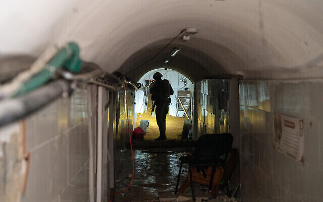 A soldier stands in a Hamas tunnel underneath a UNRWA school in Gaza City, February 8, 2024. (The Times of Israel: Emanuel Fabian/Times of Israel) A soldier stands in a Hamas tunnel underneath a UNRWA school in Gaza City, February 8, 2024. (The Times of Israel: Emanuel Fabian/Times of Israel)