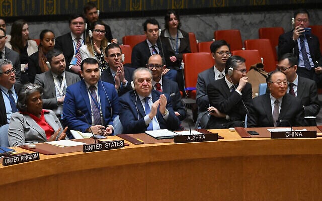 (From left) US Ambassador to the United Nations Linda Thomas-Greenfield, Algeria's Ambassador to the UN Amar Bendjama and Chinese Ambassador to the UN Zhang Jun applaud during a United Nations Security Council meeting demanding an immediate ceasefire in Gaza, at the UN headquarters in New York on March 25, 2024. (The Times of Israel: Angela Weiss/AFP) (From left) US Ambassador to the United Nations Linda Thomas-Greenfield, Algeria's Ambassador to the UN Amar Bendjama and Chinese Ambassador to the UN Zhang Jun applaud during a United Nations Security Council meeting demanding an immediate ceasefire in Gaza, at the UN headquarters in New York on March 25, 2024. (The Times of Israel: Angela Weiss/AFP)