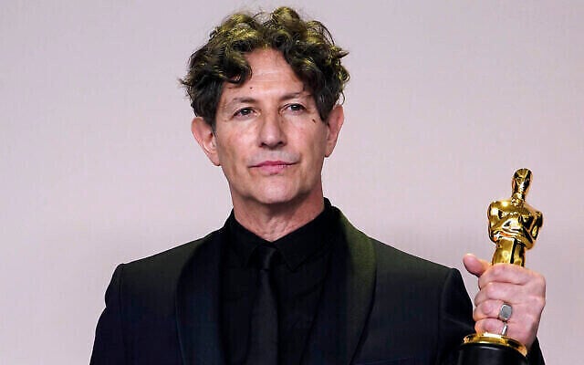 Jonathan Glazer poses with his Oscar award for "The Zone of Interest" at the Dolby Theatre, Los Angeles, March 10, 2024. (The Times of Israel: Jordan Strauss/Invision/AP) Jonathan Glazer poses with his Oscar award for "The Zone of Interest" at the Dolby Theatre, Los Angeles, March 10, 2024. (The Times of Israel: Jordan Strauss/Invision/AP)