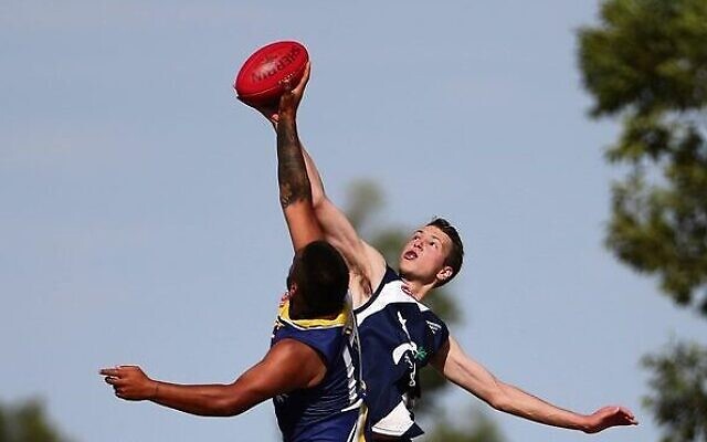 Team Israel's Saul Alford reaches for the ball in the Harmony Cup men's division 2 decider versus Nauru. Photos: Peter Haskin Team Israel's Saul Alford reaches for the ball in the Harmony Cup men's division 2 decider versus Nauru. Photos: Peter Haskin