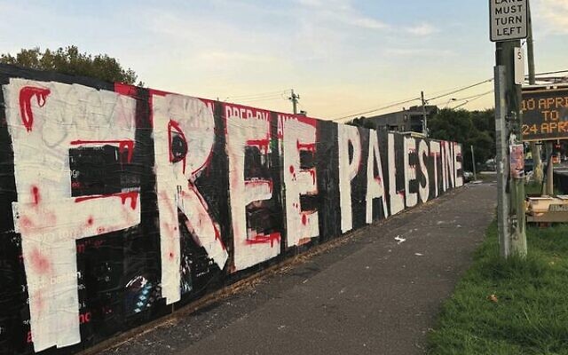 The defaced hostage poster wall in St Kilda. The defaced hostage poster wall in St Kilda.