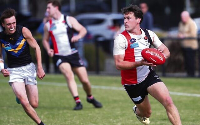 Jackas player Matt Lincoln finds space against Old Carey last Saturday at Princes Park. Photo: Peter Haskin Jackas player Matt Lincoln finds space against Old Carey last Saturday at Princes Park. Photo: Peter Haskin