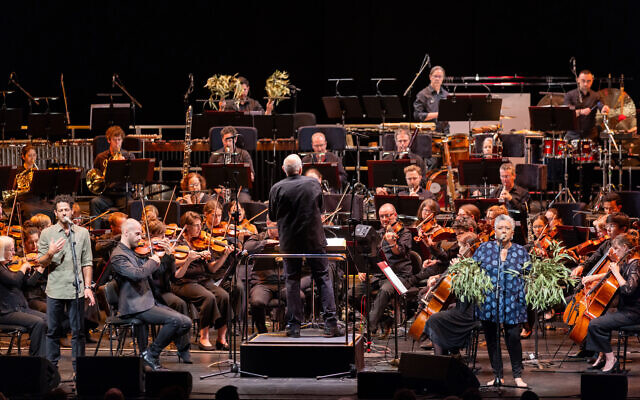 Lior (left) and Lou Bennett sing as Nigel Westlake conducts the Adelaide Symphony Orchestra in Ngapa William Cooper at the 2024 Adelaide Festival. Lior (left) and Lou Bennett sing as Nigel Westlake conducts the Adelaide Symphony Orchestra in Ngapa William Cooper at the 2024 Adelaide Festival.