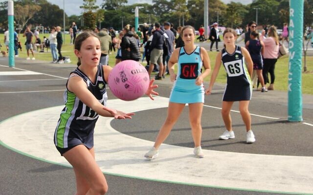Taylor Topper keeps her eyes on the ball for the Maccabi NSW White team’s 13 division 3 side in the first round of the Randwick Netball Association 2024 season last Saturday. Photo: Shane Desiatnik Taylor Topper keeps her eyes on the ball for the Maccabi NSW White team’s 13 division 3 side in the first round of the Randwick Netball Association 2024 season last Saturday. Photo: Shane Desiatnik