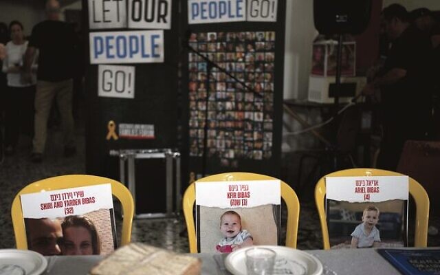 Chairs for the missing Bibas family at a symbolic Seder table at the communal dining hall at Kibbutz Nir Oz on April 11. Photo: Maya Alleruzzo/AP Chairs for the missing Bibas family at a symbolic Seder table at the communal dining hall at Kibbutz Nir Oz on April 11. Photo: Maya Alleruzzo/AP