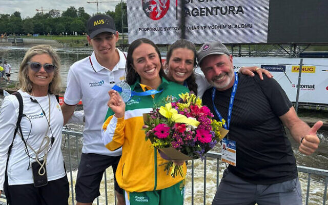 Proud as punch: Noemie Fox (front) with (from left) her mum Myriam, Australian kayak cross coach Titouan Dupras, her sister Jessica and dad Richard.
Photo: Instagram Proud as punch: Noemie Fox (front) with (from left) her mum Myriam, Australian kayak cross coach Titouan Dupras, her sister Jessica and dad Richard.
Photo: Instagram