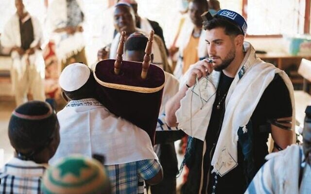Rudy Rochman with the Abayudaya Jewish community in Uganda. Photo: Instagram @wewereneverlost Rudy Rochman with the Abayudaya Jewish community in Uganda. Photo: Instagram @wewereneverlost