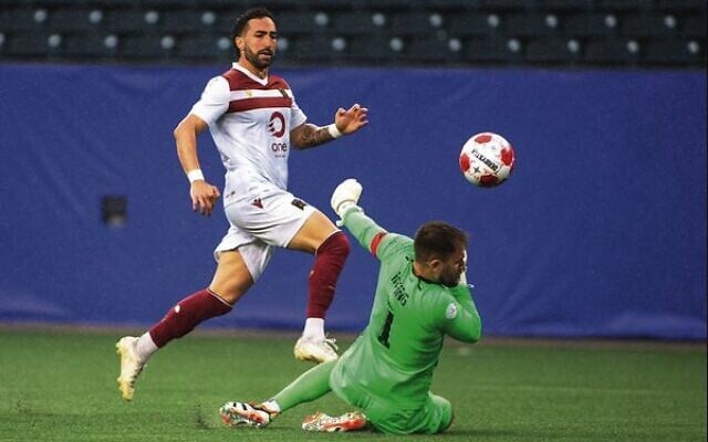 Valour FC's Jordi Swibel chips over Vancouver FC's keeper to score his second goal in the 2-0 win in Winnipeg on June 2. Photo: Cameron Bartlett/CPL Valour FC's Jordi Swibel chips over Vancouver FC's keeper to score his second goal in the 2-0 win in Winnipeg on June 2. Photo: Cameron Bartlett/CPL