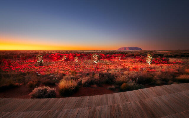 Sunrise Journeys is a new laser light and sound show at Uluru. Photo: Matt Lamb Sunrise Journeys is a new laser light and sound show at Uluru. Photo: Matt Lamb