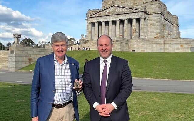 Josh Frydenberg (right) being presented with the medal outside the Shrine of Remembrance. Josh Frydenberg (right) being presented with the medal outside the Shrine of Remembrance.