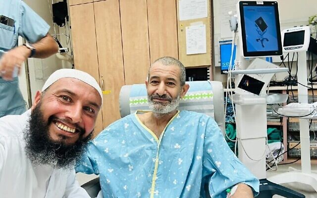 Rescued hostage Farhan al-Qadi (right) in a selfie taken by his brother at Soroka Medical Center in Beersheba on August 27, 2024. (The Times of Israel: Courtesy) Rescued hostage Farhan al-Qadi (right) in a selfie taken by his brother at Soroka Medical Center in Beersheba on August 27, 2024. (The Times of Israel: Courtesy)