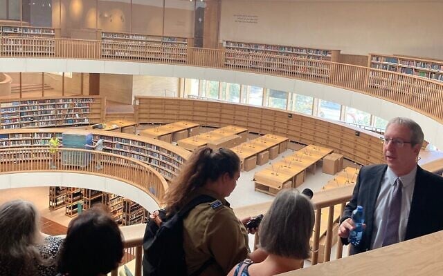 Oren Weinberg (right) giving a tour of the National Library of Israel. Photo: Jessica Steinberg/Times of Israel Oren Weinberg (right) giving a tour of the National Library of Israel. Photo: Jessica Steinberg/Times of Israel