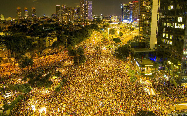 Large crowds of Israelis call for an urgent deal to secure the release of hostages held by Hamas in Gaza, outside the Defense Ministry headquarters in Tel Aviv, September 1, 2024. (The Times of Israel: Ohad Avrahami/Pro-Democracy Protest Movement) Large crowds of Israelis call for an urgent deal to secure the release of hostages held by Hamas in Gaza, outside the Defense Ministry headquarters in Tel Aviv, September 1, 2024. (The Times of Israel: Ohad Avrahami/Pro-Democracy Protest Movement)