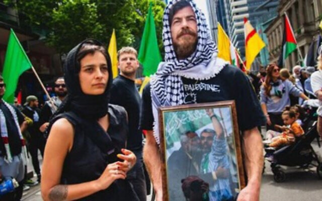 A demonstrator carries a photo of dead Hamas leader Yahya Sinwar at a rally in Melbourne ate the weekend. Photo: Instagram A demonstrator carries a photo of dead Hamas leader Yahya Sinwar at a rally in Melbourne ate the weekend. Photo: Instagram