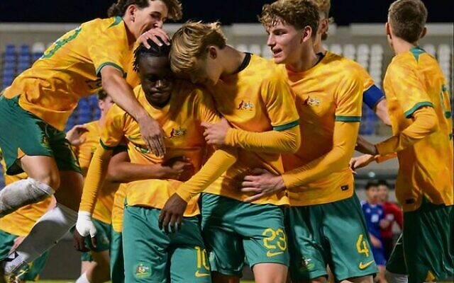 Moriah College student Jay Maltz (jumping on left) celebrates with his Joeys teammates during their 3-1 win over Kuwait.
Photo: Football Australia Moriah College student Jay Maltz (jumping on left) celebrates with his Joeys teammates during their 3-1 win over Kuwait.
Photo: Football Australia