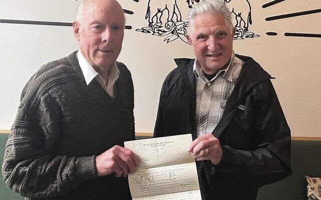 Rob Champion (left) and Rob Schneider with Albert Einstein's letter. Rob Champion (left) and Rob Schneider with Albert Einstein's letter.