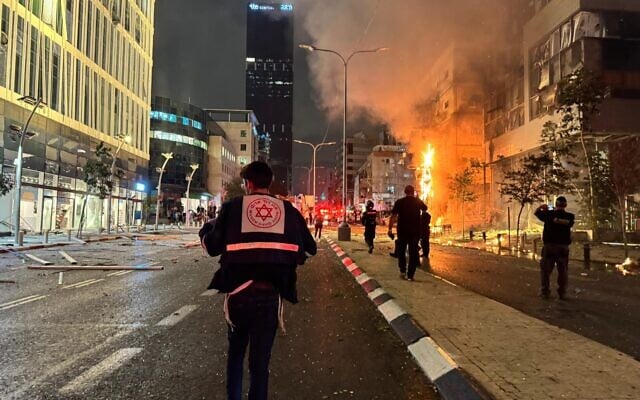 Medics at the scene of an impact of rocket fragments between Ramat Gan and Bnei Brak in central Israel, November 18, 2024. (The Times of Israel: Magen David Adom) Medics at the scene of an impact of rocket fragments between Ramat Gan and Bnei Brak in central Israel, November 18, 2024. (The Times of Israel: Magen David Adom)