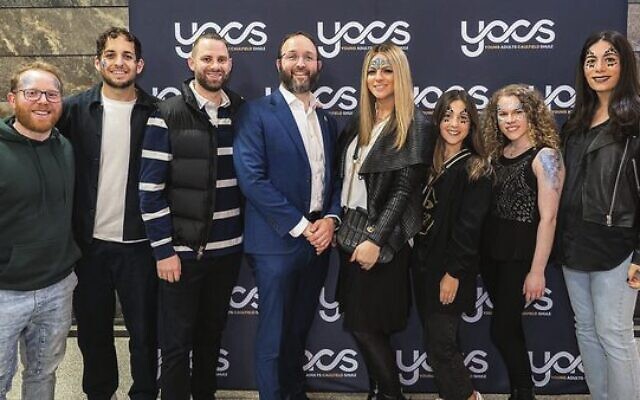 Rabbi Daniel and Rebbetzin Sarah Rabin (centre) with YACS members. Photo: Supplied Rabbi Daniel and Rebbetzin Sarah Rabin (centre) with YACS members. Photo: Supplied