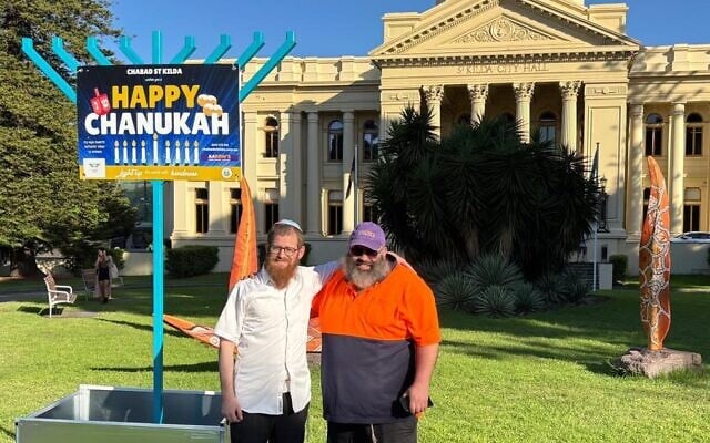 Rabbi Effy Block setting up the Hannkkah menorah outside the St Kilda Town Hall. Rabbi Effy Block setting up the Hannkkah menorah outside the St Kilda Town Hall.