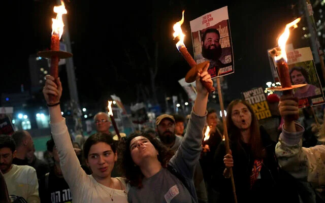Israelis react to the ceasefire announcement as they take part in a demonstration in Tel Aviv, Israel, January 15, 2025. Photo: AP Photo/Ohad Zwigenberg Israelis react to the ceasefire announcement as they take part in a demonstration in Tel Aviv, Israel, January 15, 2025. Photo: AP Photo/Ohad Zwigenberg