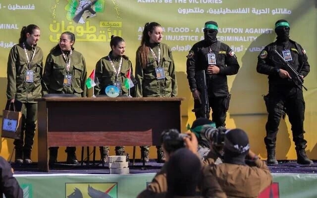 Israeli female soldier hostages Naama Levy, Daniella Gilboa, Karina Ariev and Liri Albag, in no particular order, and on a stage in front of a Palestinian crowd before being handed over to the Red Cross in Gaza City, Saturday, Jan. 25, 2025. (AP Photo/Abed Hajjar) Israeli female soldier hostages Naama Levy, Daniella Gilboa, Karina Ariev and Liri Albag, in no particular order, and on a stage in front of a Palestinian crowd before being handed over to the Red Cross in Gaza City, Saturday, Jan. 25, 2025. (AP Photo/Abed Hajjar)
