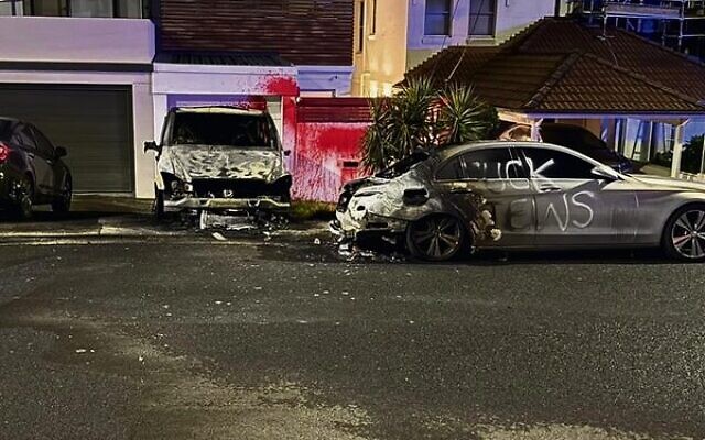 In Dover Heights cars were set ablaze, antisemitic slogans were graffitied on firebombed cars and the former house of Executive Council of Australian Jewry co-CEO Alex Ryvchin was doused in red paint. In Dover Heights cars were set ablaze, antisemitic slogans were graffitied on firebombed cars and the former house of Executive Council of Australian Jewry co-CEO Alex Ryvchin was doused in red paint.