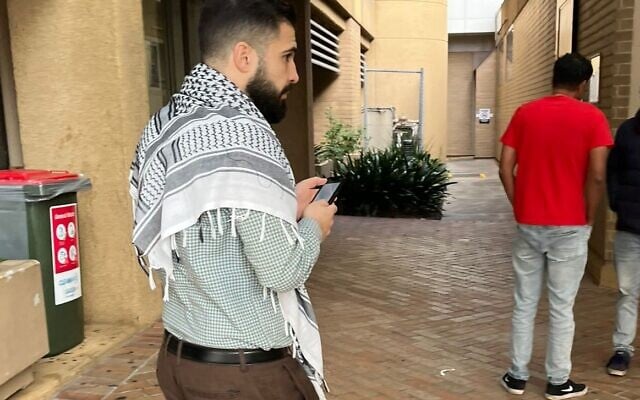 A junior doctor wearing a keffiyeh at a Melbourne Hospital. A junior doctor wearing a keffiyeh at a Melbourne Hospital.