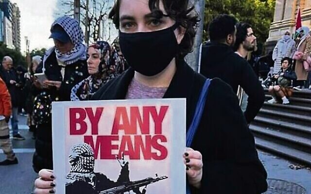 Offensive poster calling for violence at an anti-Israel rally in Melbourne. Offensive poster calling for violence at an anti-Israel rally in Melbourne.