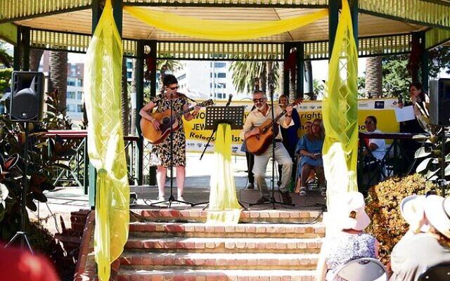 Deborah Conway and Willy Zygier perform at a rally to mark International Women's Day on March 7 in Catani Gardens. Photo: Peter Haskin. Deborah Conway and Willy Zygier perform at a rally to mark International Women's Day on March 7 in Catani Gardens. Photo: Peter Haskin.