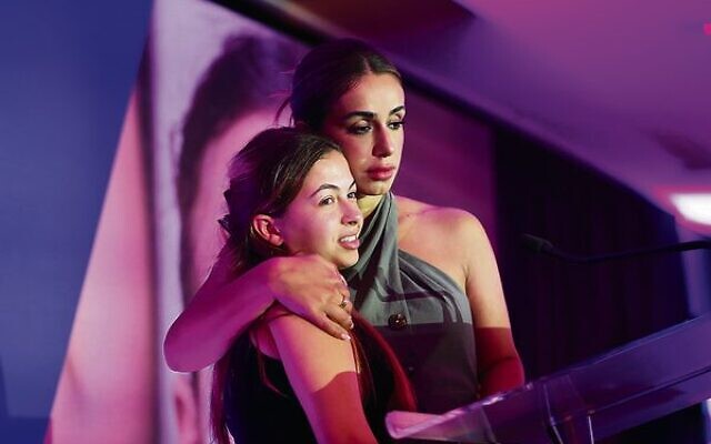 Gali Eilon is comforted by Elica Le Bon during her speech at the UIA Women's Division event in Melbourne on March 19. Photo: Peter Haskin. Gali Eilon is comforted by Elica Le Bon during her speech at the UIA Women's Division event in Melbourne on March 19. Photo: Peter Haskin.