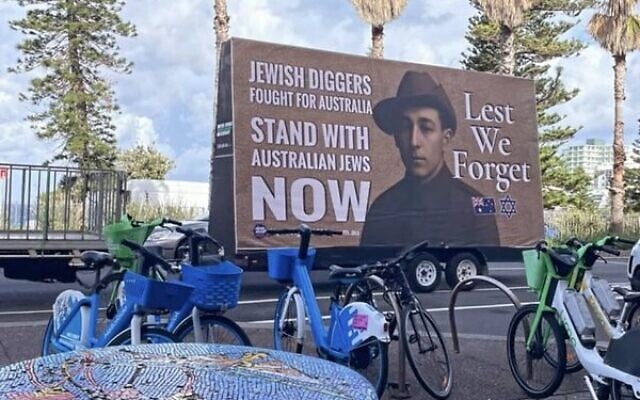 A Never Again Is Now billboard truck at Bondi Beach in Sydney. A Never Again Is Now billboard truck at Bondi Beach in Sydney.