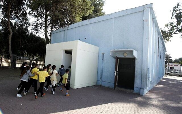 Israeli children run into a bomb shelter. Photo: Supplied Israeli children run into a bomb shelter. Photo: Supplied