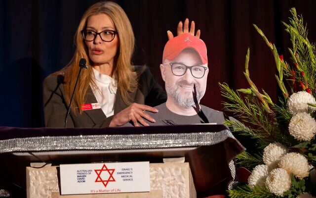 AFMDA general manager Tamara Porat holding a cardboard cut-out of Hillel Fuld. Photo: Nadine Saacks AFMDA general manager Tamara Porat holding a cardboard cut-out of Hillel Fuld. Photo: Nadine Saacks