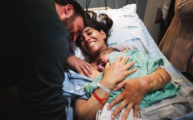 Dr Elay Golan and her husband, Ariel, pictured after she gave birth to their second child, a healthy miracle baby boy, following her life-threatening injuries on October 7. Photo: Ziv Koren Dr Elay Golan and her husband, Ariel, pictured after she gave birth to their second child, a healthy miracle baby boy, following her life-threatening injuries on October 7. Photo: Ziv Koren