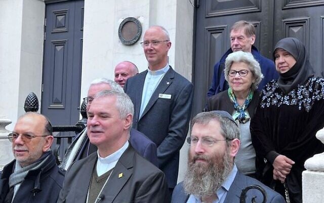 Religious leaders gathered at the arson-hit East Melbourne synagogue on Thursday morning. L to R at the front: Rabbi Ralph Genende, Archbishop Peter Comensoli, Rabbi Dovid Gutnick. Photo: Bruce Hill. Religious leaders gathered at the arson-hit East Melbourne synagogue on Thursday morning. L to R at the front: Rabbi Ralph Genende, Archbishop Peter Comensoli, Rabbi Dovid Gutnick. Photo: Bruce Hill.