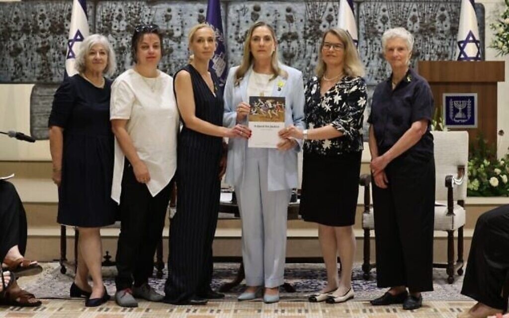 The authors of the Dinah Project's report on sexual violence on and since October 7 are pictured with First Lady Michal Herzog (center) at the President's Residence, Jerusalem, July 8, 2025. (Itzik Biran) The authors of the Dinah Project's report on sexual violence on and since October 7 are pictured with First Lady Michal Herzog (center) at the President's Residence, Jerusalem, July 8, 2025. (Itzik Biran)