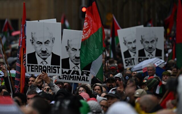 Images of Benjamin Netanyahu with a Hitler moustache at the "March for Humanity" on Sunday. Photo: AAP Image/Dean Lewins Images of Benjamin Netanyahu with a Hitler moustache at the "March for Humanity" on Sunday. Photo: AAP Image/Dean Lewins