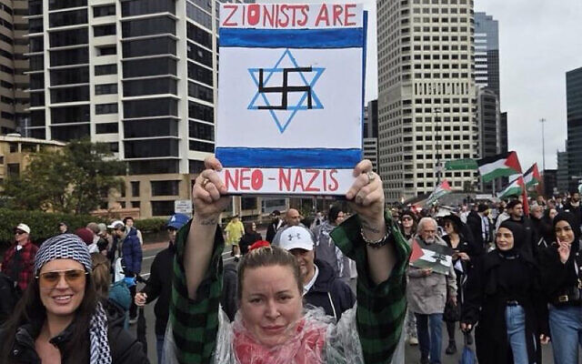 A protester holds up an offensive sign during Sunday's so-called "March for Humanity". Photo: Facebook A protester holds up an offensive sign during Sunday's so-called "March for Humanity". Photo: Facebook