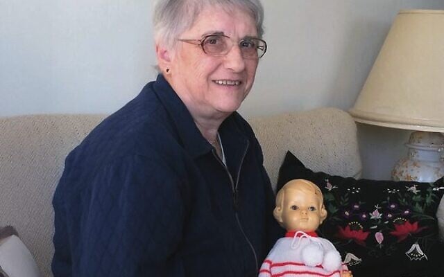 Judith Nagy holding Zsuszi the doll. Photo: Ros Sugarman Judith Nagy holding Zsuszi the doll. Photo: Ros Sugarman
