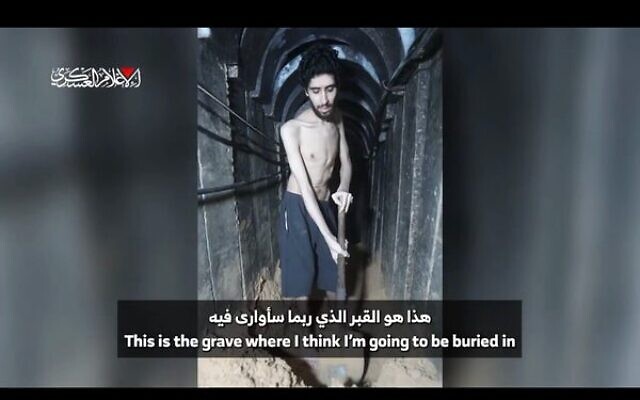 Hamas-held hostage Evyatar David filmed digging what he says he fears will be his own grave in a tunnel in Gaza, in a Hamas propaganda video released earlier this month. Hamas-held hostage Evyatar David filmed digging what he says he fears will be his own grave in a tunnel in Gaza, in a Hamas propaganda video released earlier this month.