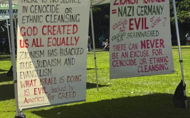 Offensive banners hung from Greens MP Elizabeth Watson-Brown's banners in Brisbane. Photo: Facebook Offensive banners hung from Greens MP Elizabeth Watson-Brown's banners in Brisbane. Photo: Facebook