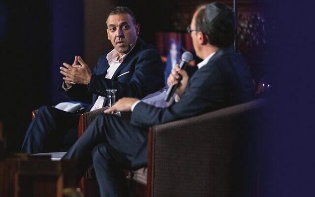 Former hostage Eli Sharabi in conversation with Nadav Eyal at the JNF Victoria event on September 4. Photo: JNF Vic. Former hostage Eli Sharabi in conversation with Nadav Eyal at the JNF Victoria event on September 4. Photo: JNF Vic.