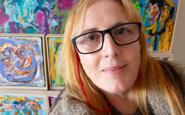 Wendy with her artworks. Photo: supplied Wendy with her artworks. Photo: supplied