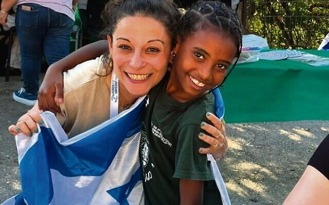 Carli Dvash with an Ethiopian olim at an Absorption Centre in Tzfat. Carli Dvash with an Ethiopian olim at an Absorption Centre in Tzfat.