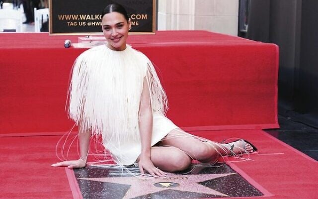 Gal Gadot poses with her star on the Hollywood Walk of Fame.
Photo: Jordan Strauss/Invision/AP Gal Gadot poses with her star on the Hollywood Walk of Fame.
Photo: Jordan Strauss/Invision/AP